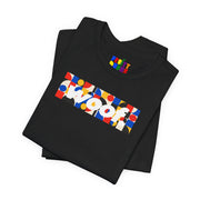 Woof. | Primary Play Pride T-shirt