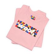 Woof. | Primary Play Pride T-shirt