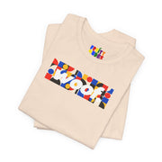 Woof. | Primary Play Pride T-shirt