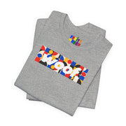 Woof. | Primary Play Pride T-shirt
